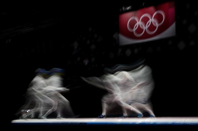 百家乐-日媒：菅义伟不考虑取消奥运 男重团体金牌“悲愿”